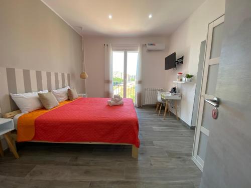 Postel nebo postele na pokoji v ubytování La Piccola Formica Charme Rooms