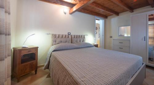 Ένα ή περισσότερα κρεβάτια σε δωμάτιο στο One bedroom appartement at Capitana 350 m away from the beach with sea view garden and wifi