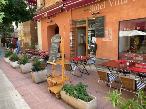 En restaurang eller annat matställe på Hotel Villa La Tour