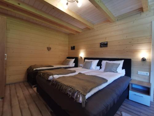 Ein Bett oder Betten in einem Zimmer der Unterkunft Tauern Appartements