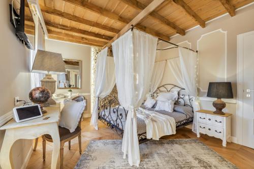 Giường trong phòng chung tại Sweet Holidays - Lerici e 5 Terre