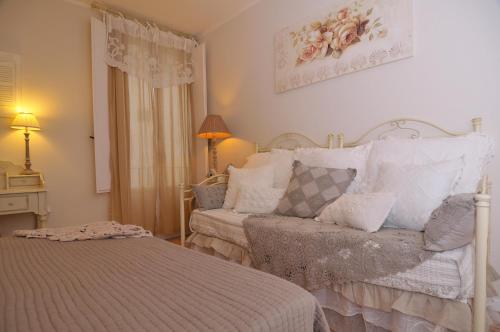 Cama o camas de una habitación en Vacanze Romantiche a Modica