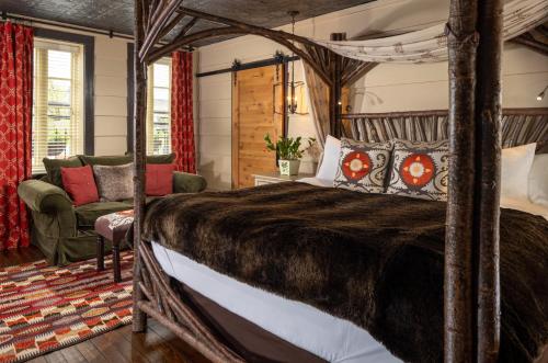 A bed or beds in a room at The White Birch Inn