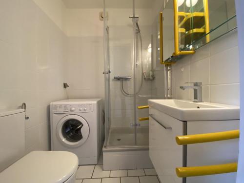 Ένα μπάνιο στο Ferienwohnung Dünengraf