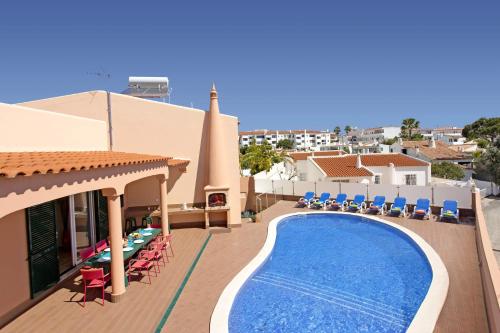a view of a swimming pool on a house at Villa Siroco by Villa Plus in Albufeira