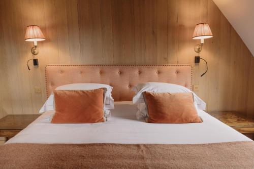 Letto o letti in una camera di La Maison De Lucie