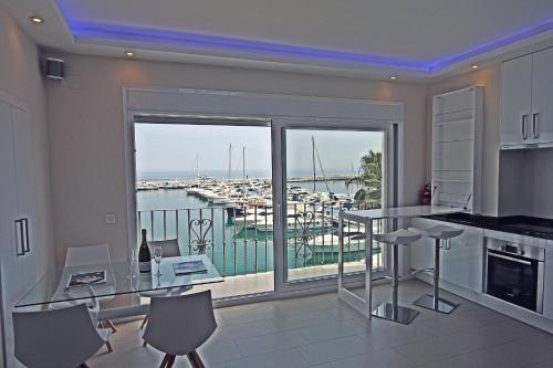 MARBELLA HOME RENTALS - Frontline 2BR Penthouse, Puerto Banus