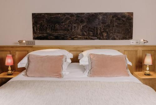 Letto o letti in una camera di La Maison De Lucie