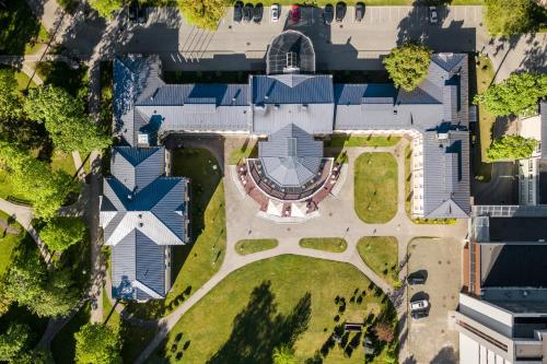 an aerial view of a house with a yard at Europa Royale Druskininkai in Druskininkai
