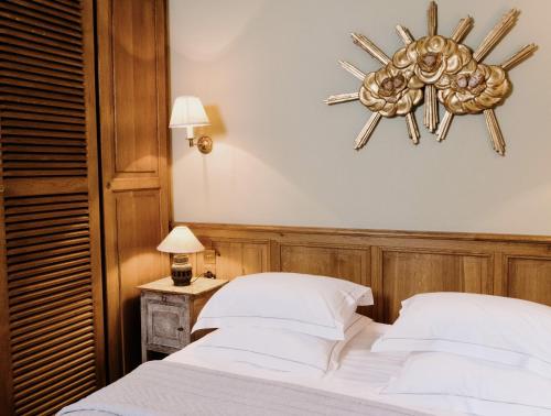 Letto o letti in una camera di La Maison De Lucie