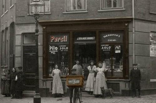a group of women standing in front of a store at Studio Gerenoveerde winkel in Arnhem