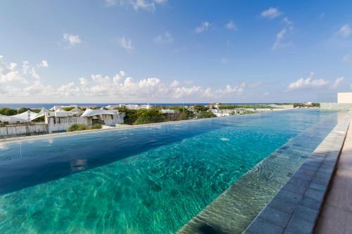 Swimmingpoolen hos eller tæt på MAGNÍFICO ESTUDIO CON ROOFTOP CERCA DE 5TA AVENIDA