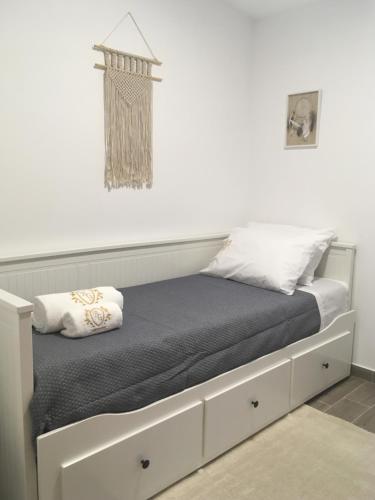 Llit o llits en una habitació de Barão Guesthouse