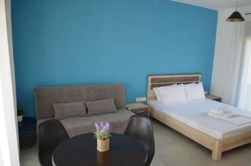 Posteľ alebo postele v izbe v ubytovaní Erika Boutique Apartments