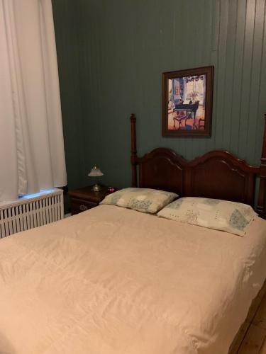 Katil atau katil-katil dalam bilik di Gîte Le Roupillon en Beauce