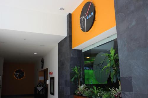 a sign on the side of a building at Crowne Plaza Leon by IHG in León
