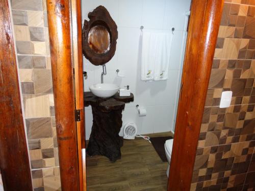 Um banheiro em Pousada Recanto dos Pôneis Rio Rufino Urubici