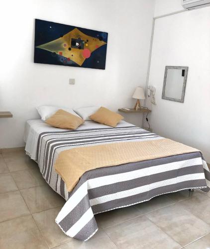 Postel nebo postele na pokoji v ubytování Katsikantaris Homes