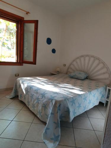 Posteľ alebo postele v izbe v ubytovaní Rena Majore casa vacanze IL CORBEZZOLO
