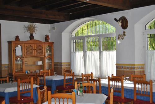 En restaurant eller et spisested på Hostal Rural Amador