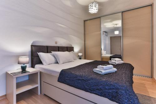 Кровать или кровати в номере Luxury Fontana Apartments