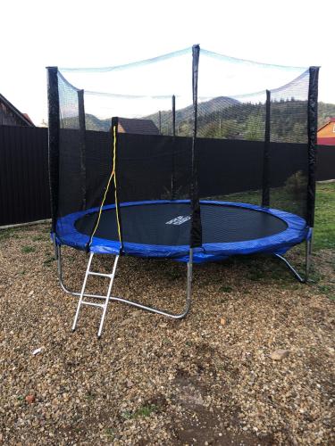 a trampoline with a net on top of it at Mountain Residence in Tukhlya