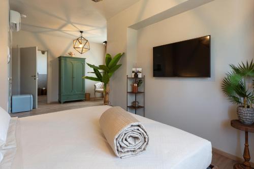Postel nebo postele na pokoji v ubytování Relais San Baio