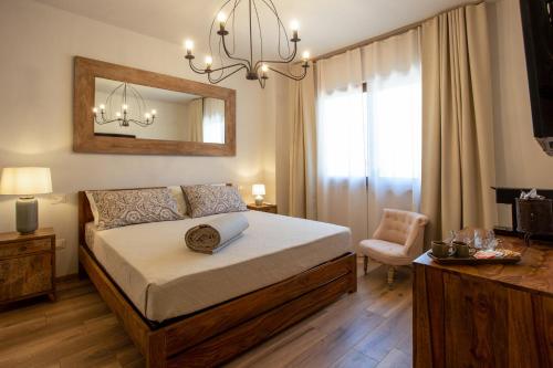 Postel nebo postele na pokoji v ubytování Relais San Baio