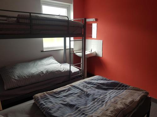Ένα ή περισσότερα κρεβάτια σε δωμάτιο στο Blue Room Hostel Newquay