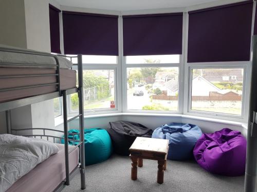 Ένα ή περισσότερα κρεβάτια σε δωμάτιο στο Blue Room Hostel Newquay