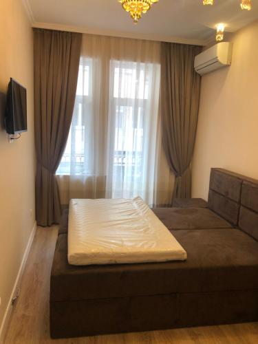 A television and/or entertainment centre at CENTER APARTMENT PLOVDIV