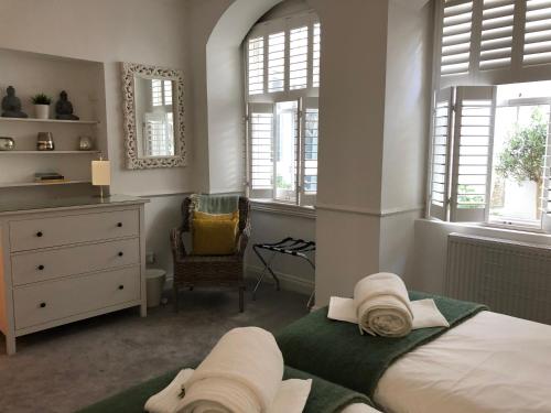 Katil atau katil-katil dalam bilik di Olive Tree Apartment Hove