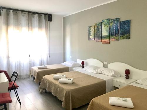 Un pat sau paturi într-o cameră la Guest House Brianza Room