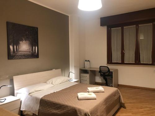 Postel nebo postele na pokoji v ubytování Guest House Brianza Room