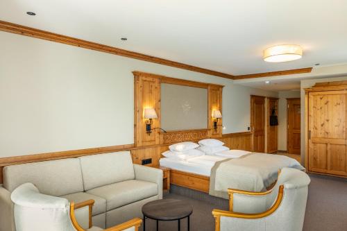 Uma área de estar em Hotel Grünauerhof