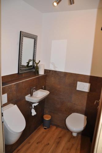 Ένα μπάνιο στο Ferienwohnung Staudach, Apartment