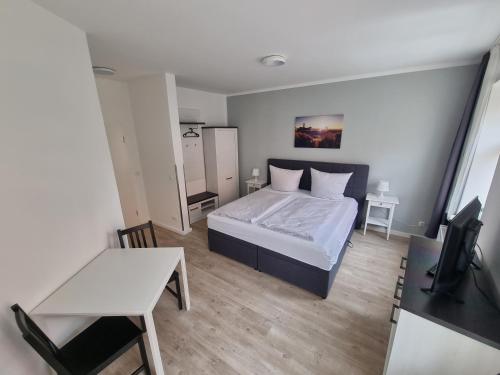 Ένα ή περισσότερα κρεβάτια σε δωμάτιο στο Nikolai Appartements