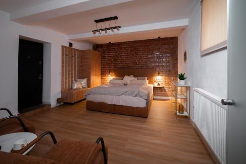 Ein Bett oder Betten in einem Zimmer der Unterkunft Sibiu Escape Residence