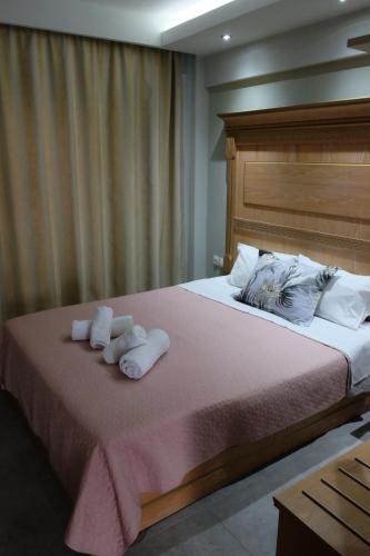 Ένα ή περισσότερα κρεβάτια σε δωμάτιο στο ONAR by the sea Luxurious Apartments