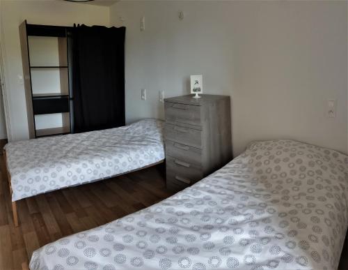 Postel nebo postele na pokoji v ubytování gîte de la Veillée