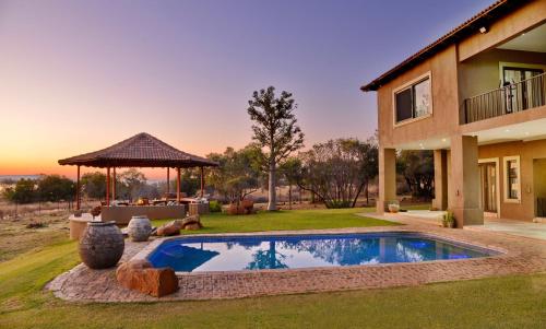 The swimming pool at or close to Kameeldrift Waterfront Estate & Resort