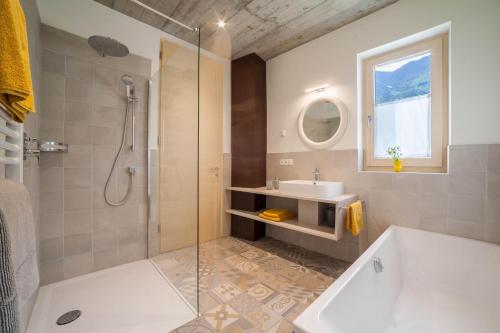 Kylpyhuone majoituspaikassa Apartment Das Eckige