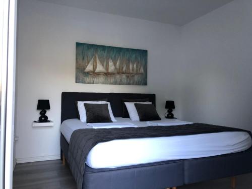 Postel nebo postele na pokoji v ubytování Ada Vis Apartments