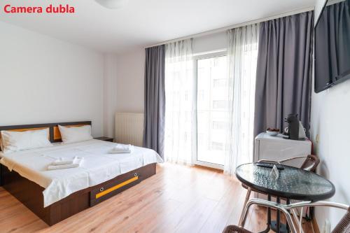 Postel nebo postele na pokoji v ubytování Zeka's Properties