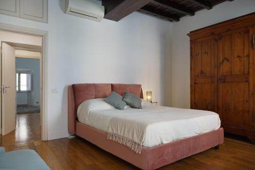 Posteľ alebo postele v izbe v ubytovaní Barberini Apartment