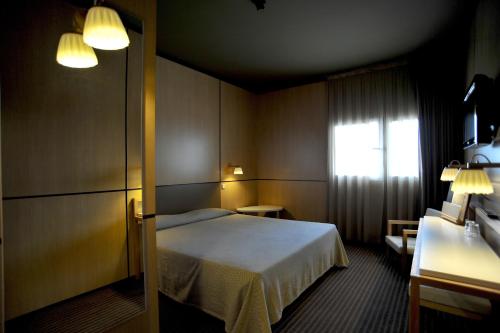 Katil atau katil-katil dalam bilik di Axis Vermar Conference & Beach Hotel