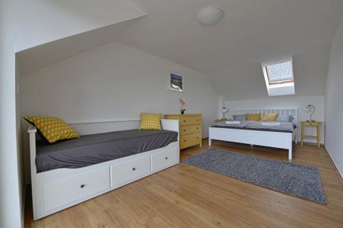 Postel nebo postele na pokoji v ubytování Apartmán Ubytování De Donawitz - Dolní Dunajovice