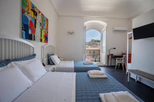 Voodi või voodid majutusasutuse Bed and Breakfast Terra del Sole Ibla toas