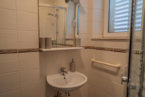 Koupelna v ubytování Guesthouse Kamarin