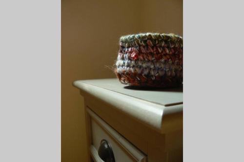a basket is sitting on top of a counter at L'Approdo Bilocale in Carloforte